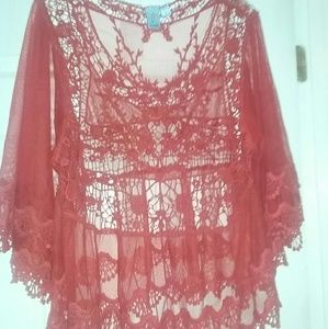 A very elegant lace blouse.